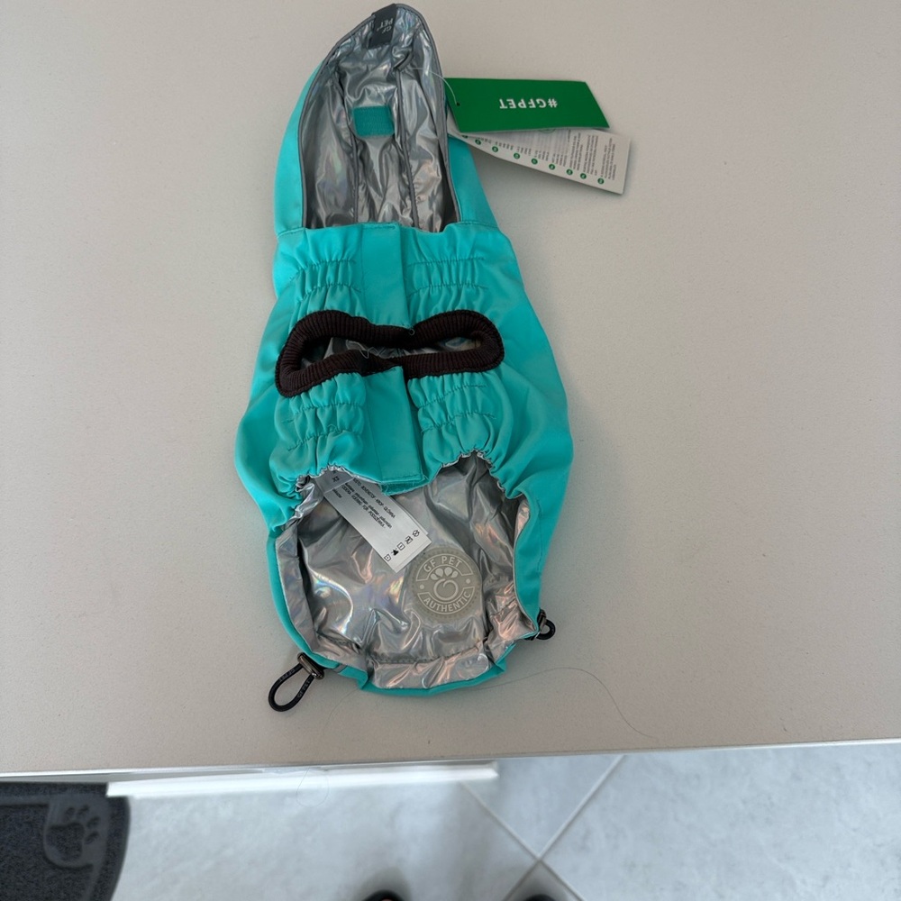 GT Pet Reversible Raincoat in Aqua and Silver with hood